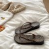 2538 leopard print wedge flip flops